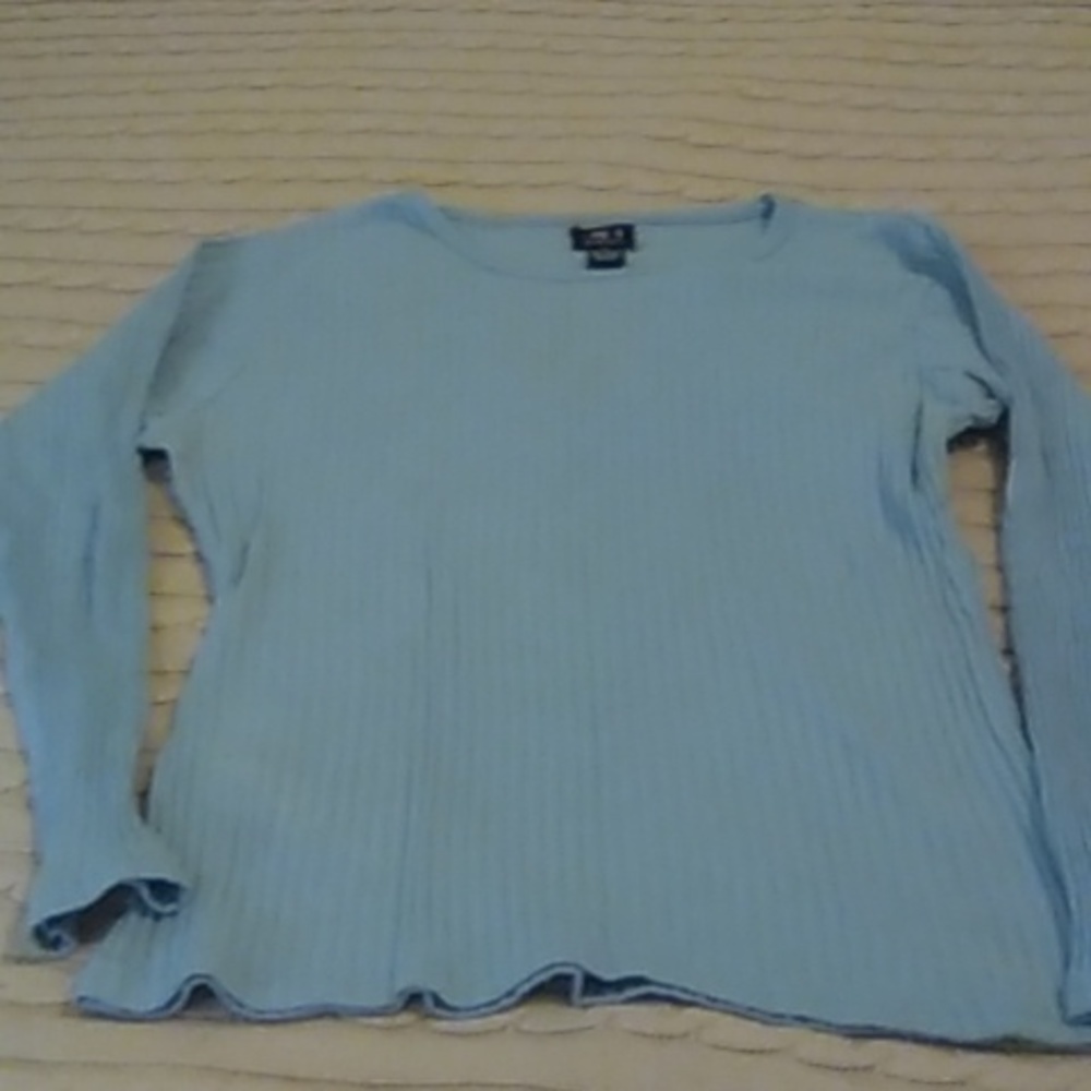 "New" Unity Casual long sleeves sweater size large light blue. Never used.